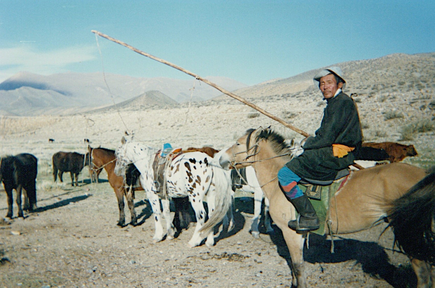 Buriat on his horse by his Ail at Khar Us Nuur