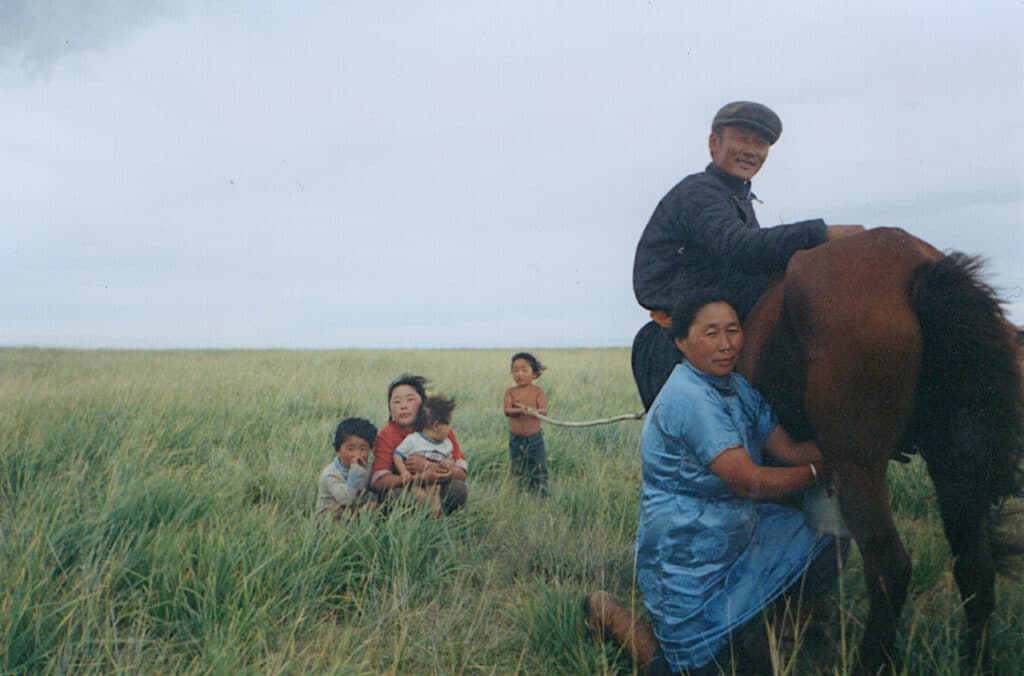 Chandman' Sum Tsagaantsogts milks the horse 1993