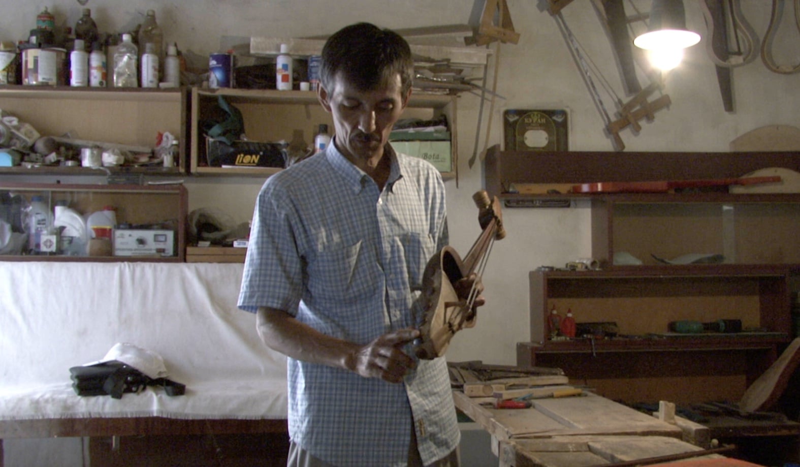 Maratbek in his studio explaining about his Kyl-Kiyak